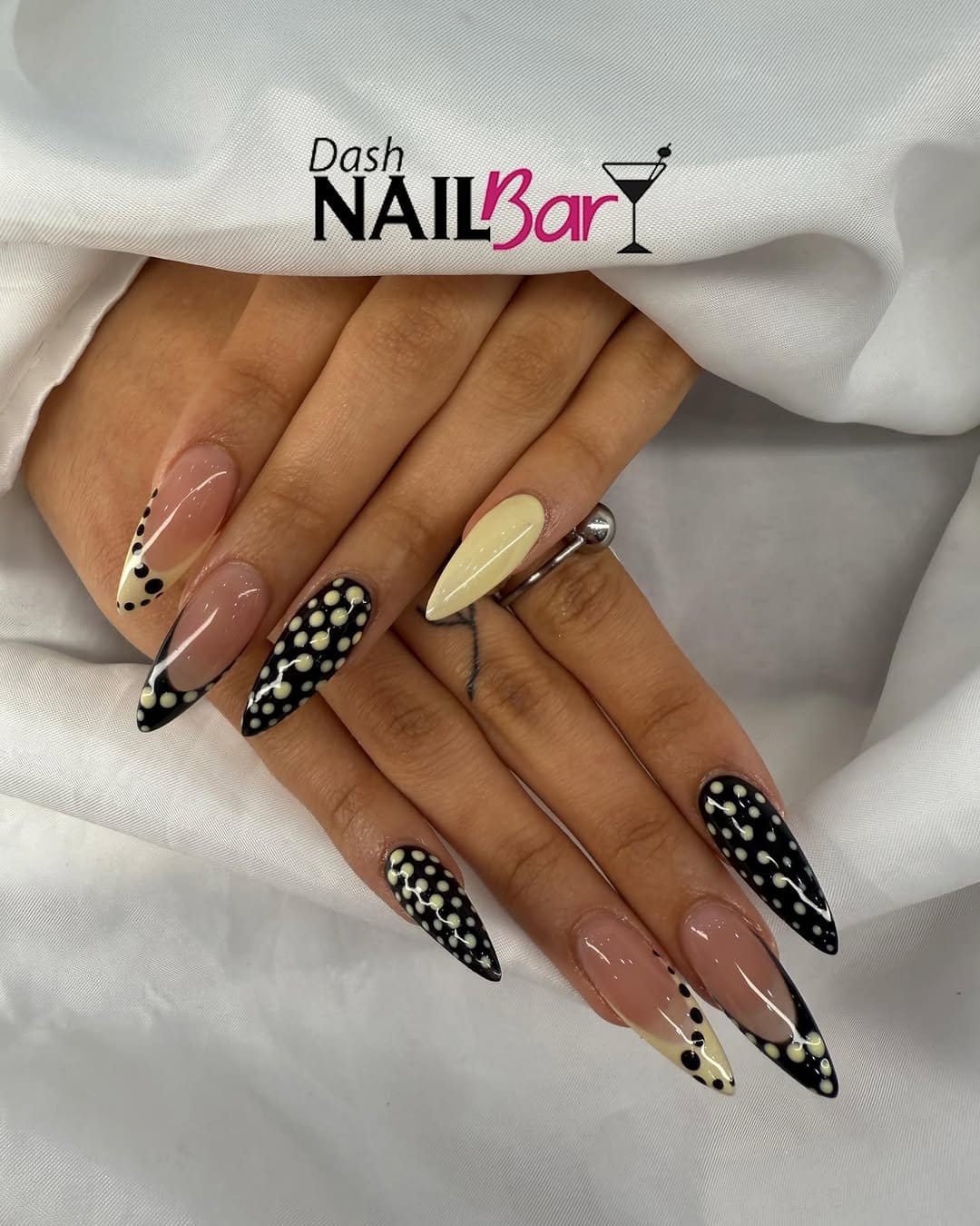 Vibrant striped and dotted nails