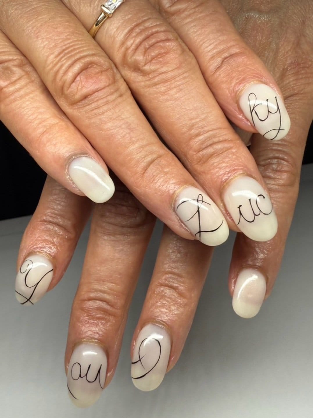 Yellow nails with minimalistic line art
