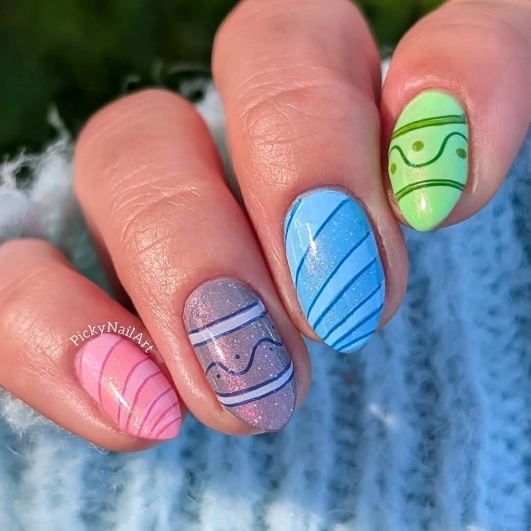 Pistachio pastel nails with geometric patterns