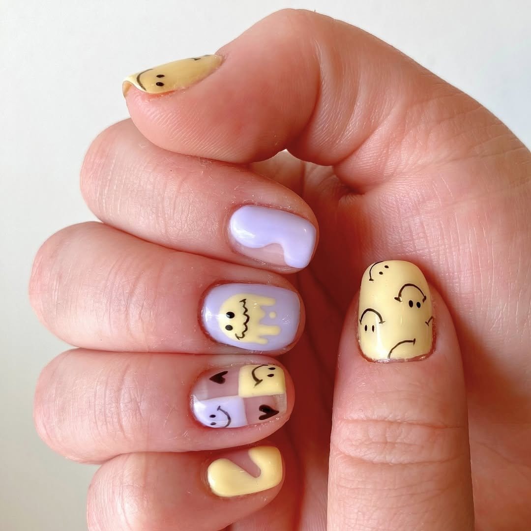 Lavender and lemon yellow nails