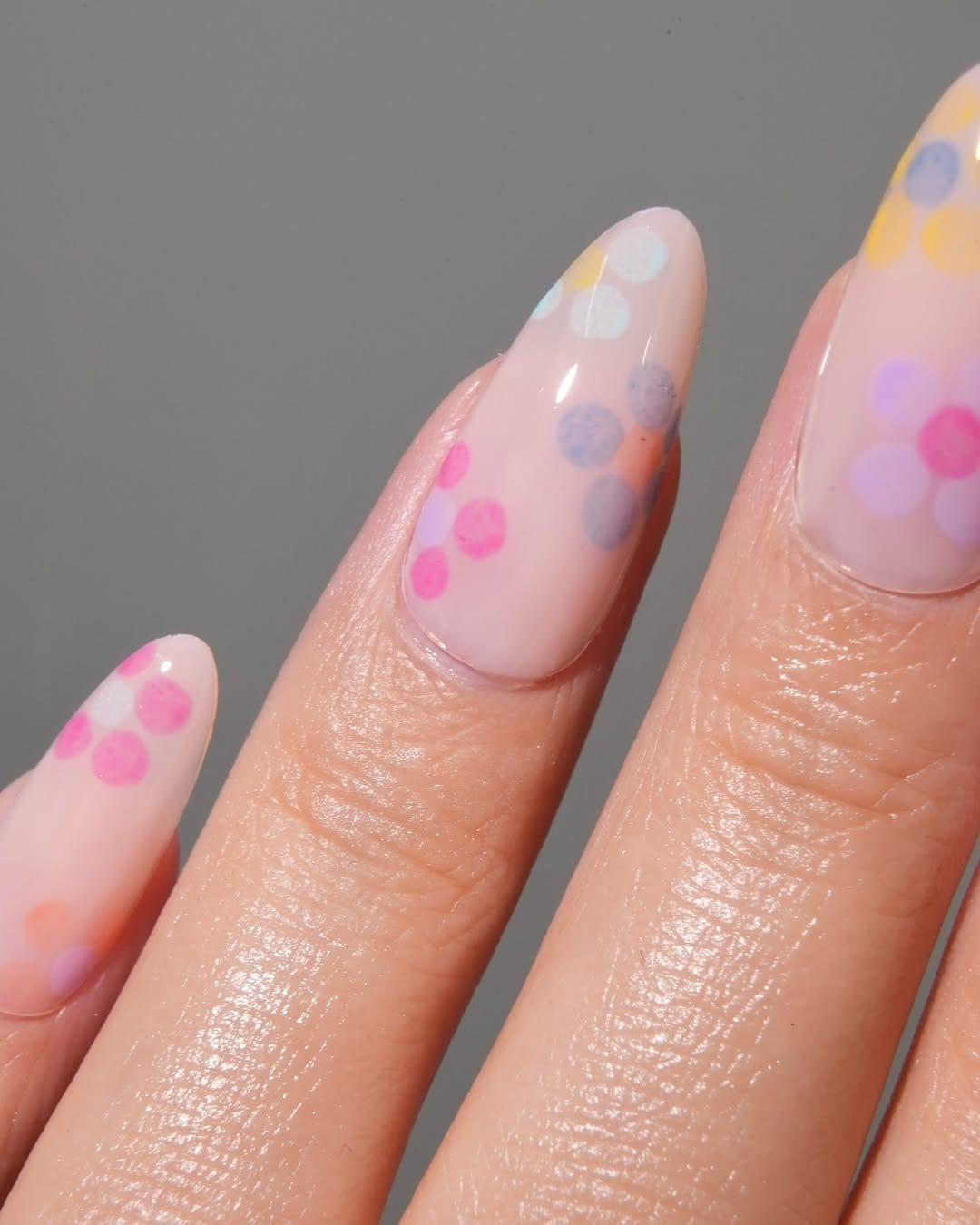 Pastel colors with sunflower nail design