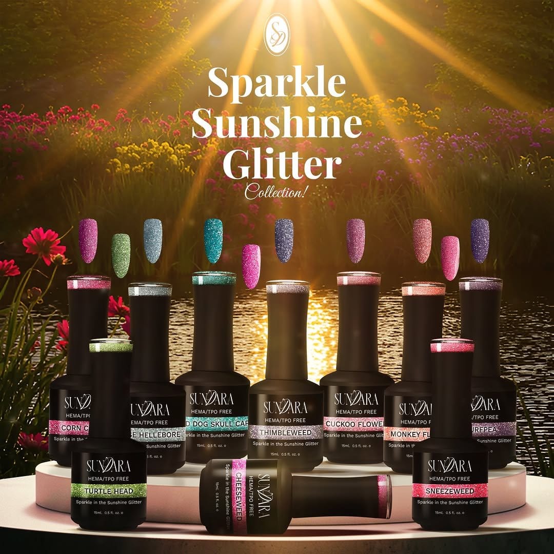 Glittery yellow nail polish with sunbeam design