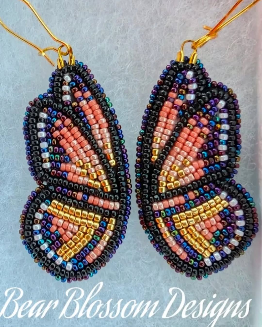 Butterfly wing nail art with vibrant colors