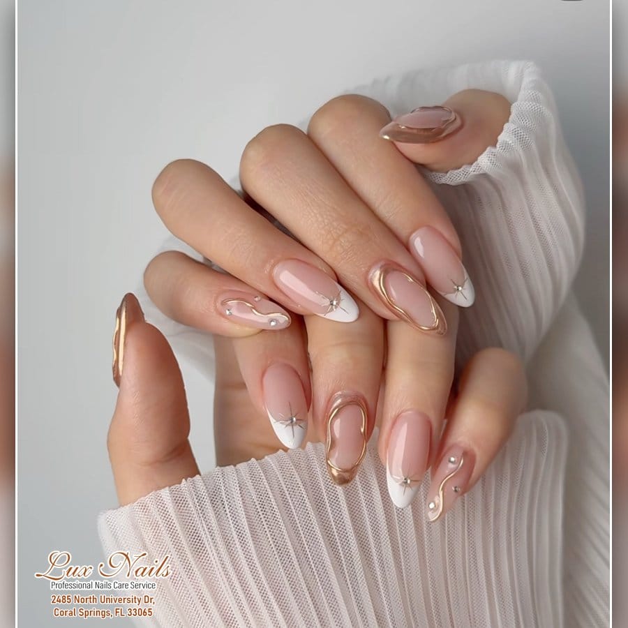 French tip nails with metallic line accent