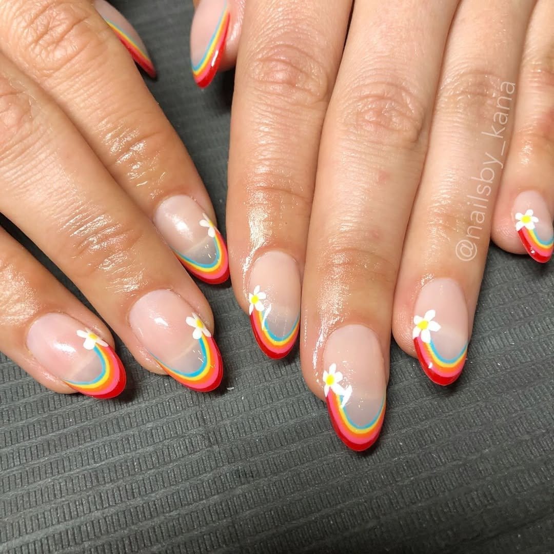 Rainbow French tip nails on nude base