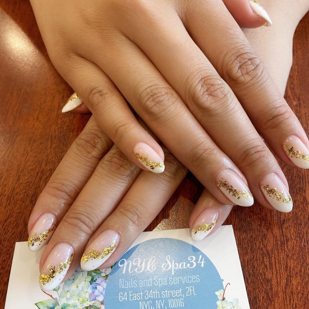Colorful foil French tip nails with vibrant accents
