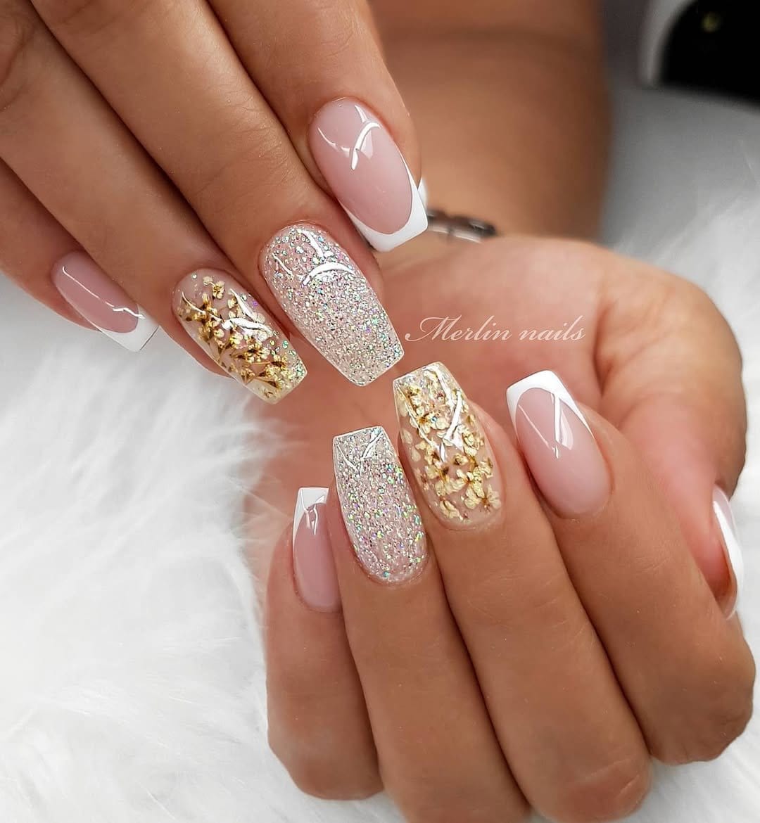 White nails with galaxy effect