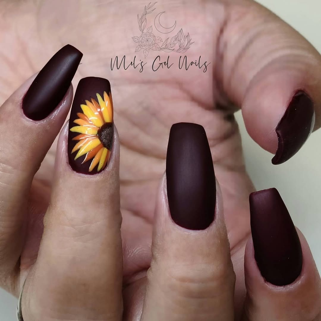 Red sunflower nail design