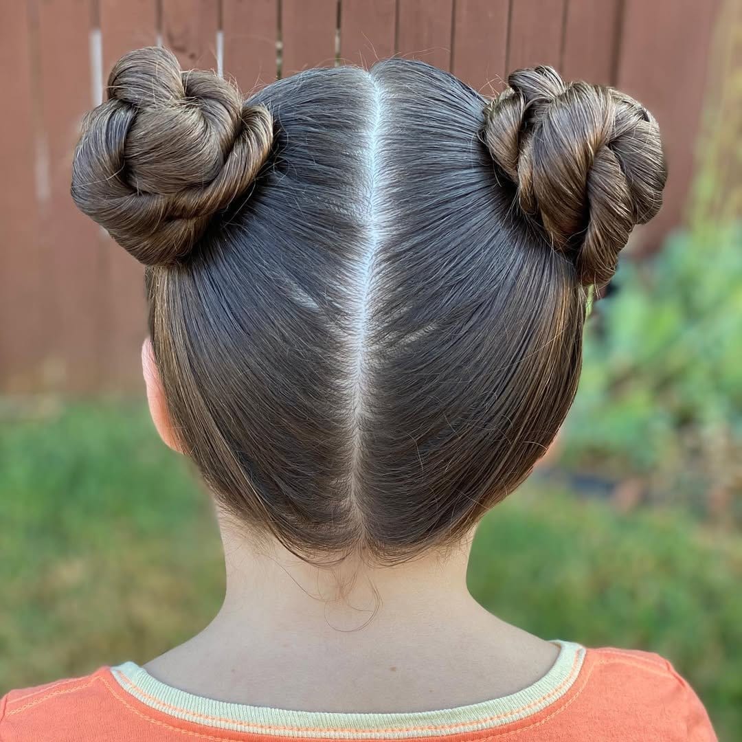 Funky space buns with short dreadlocks