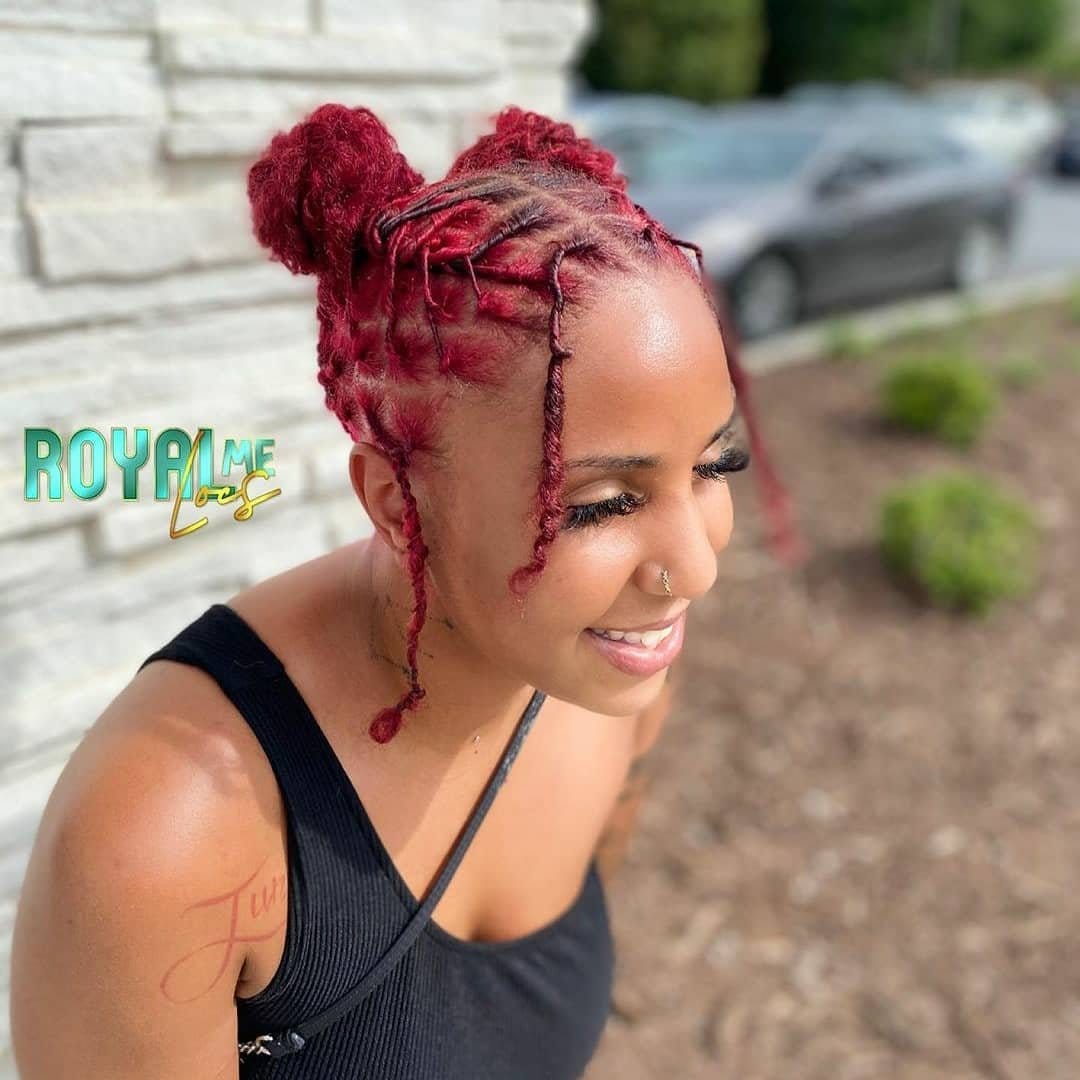 Accessorized short dreadlocks with gold cuffs