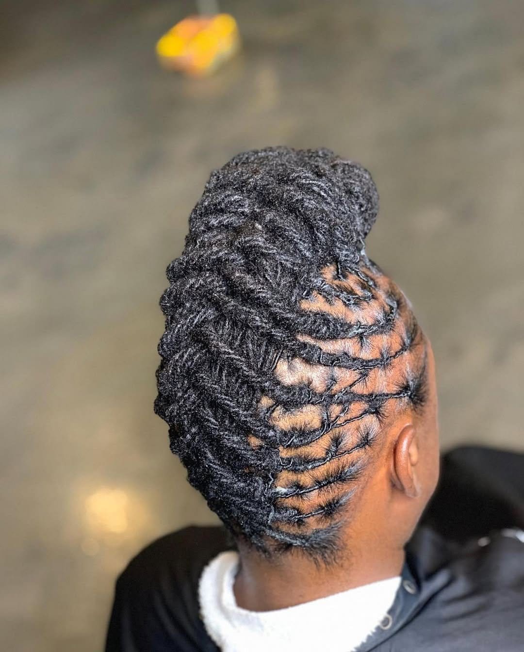 Bold pompadour with short dreadlocks