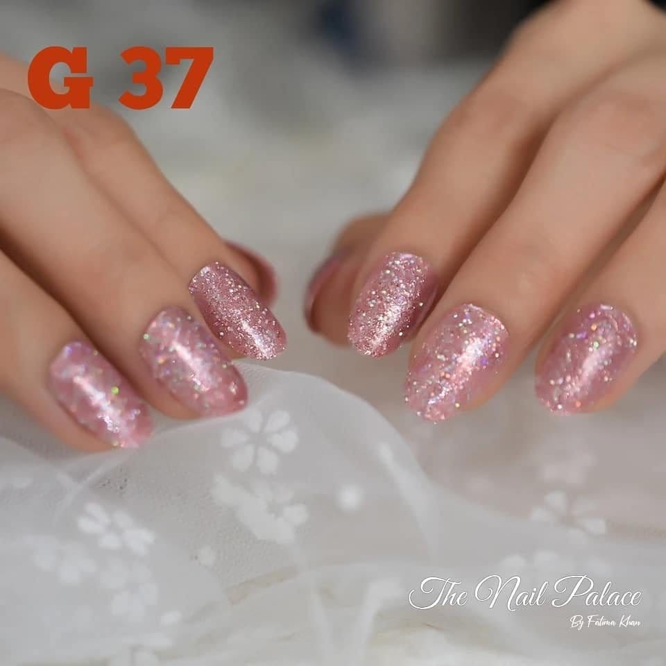 Glitter tips on light pink nails