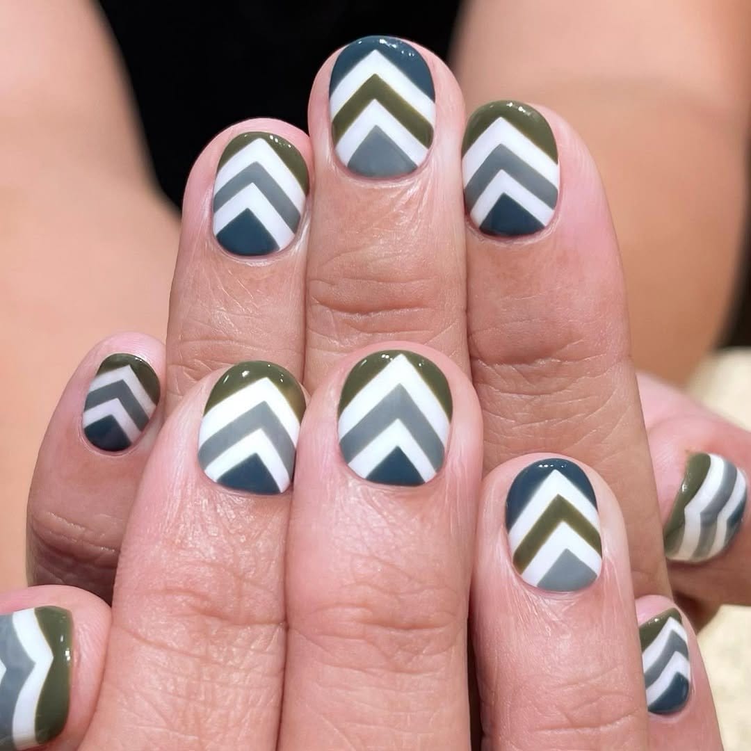 White nails with chevron patterns