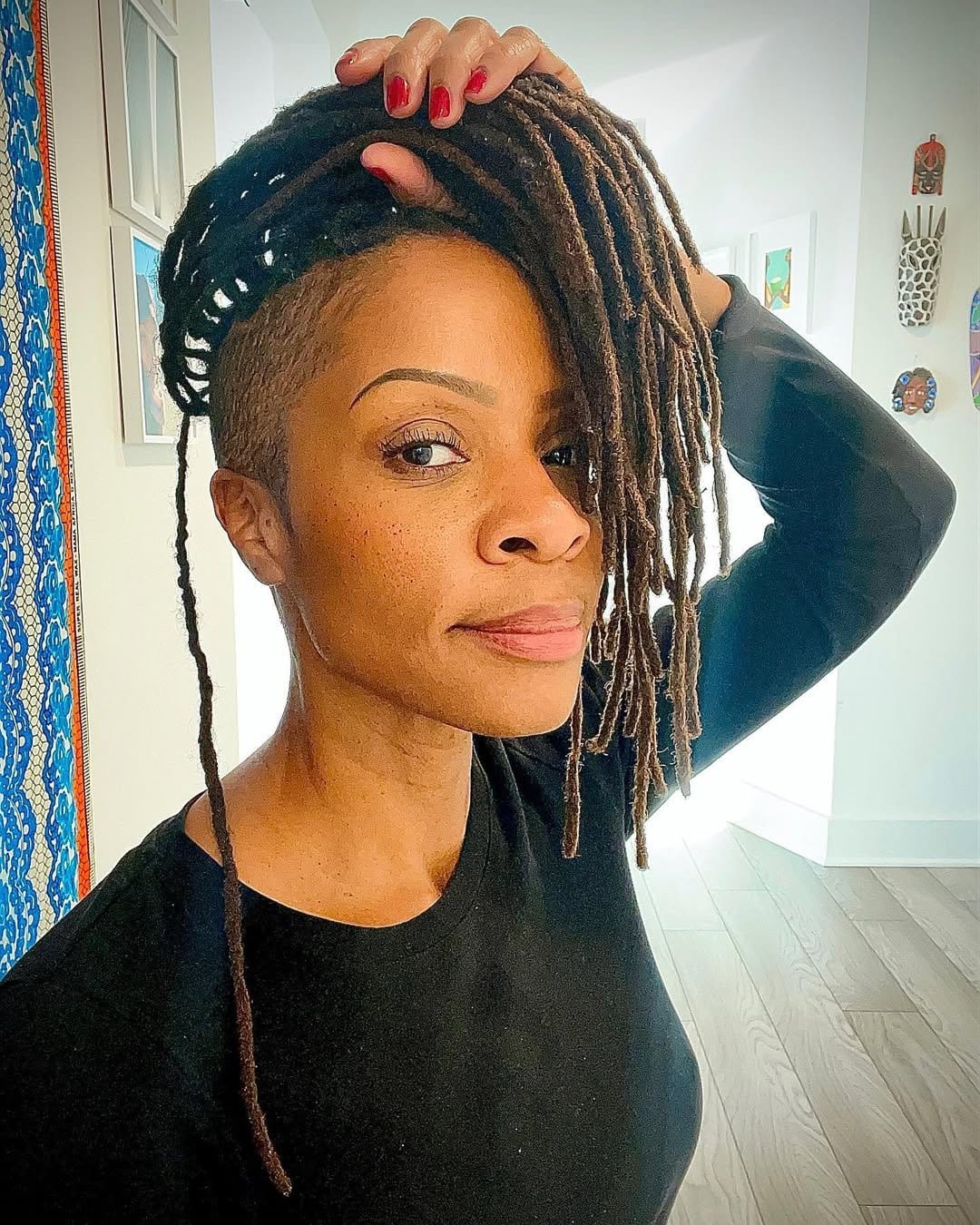 Short dreadlocks with bold undercut