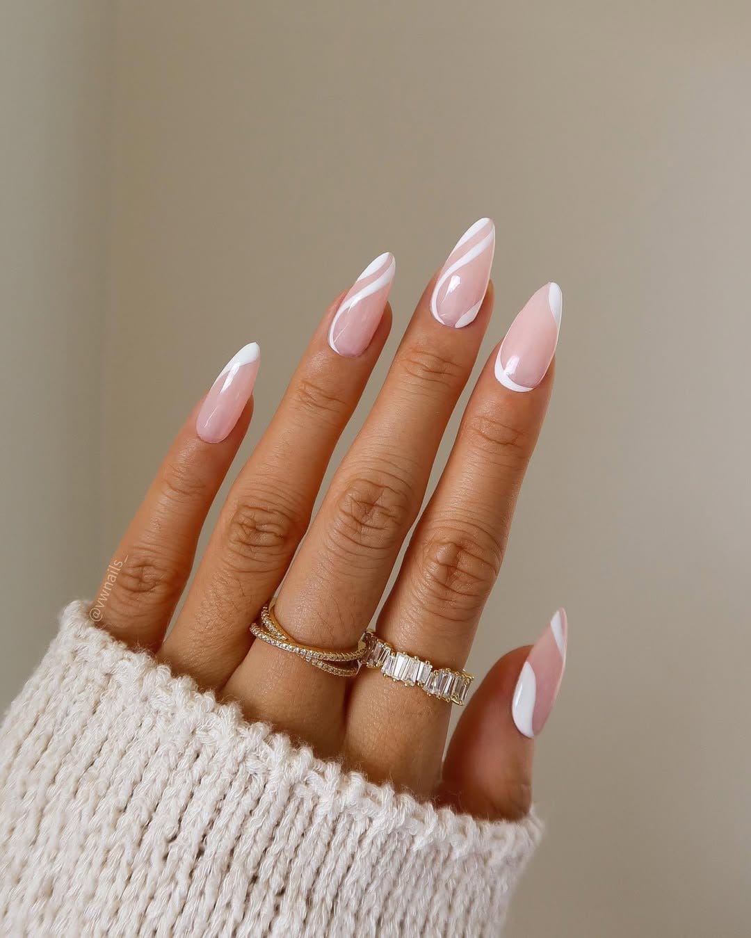 Ice blue nails with white swirl accents