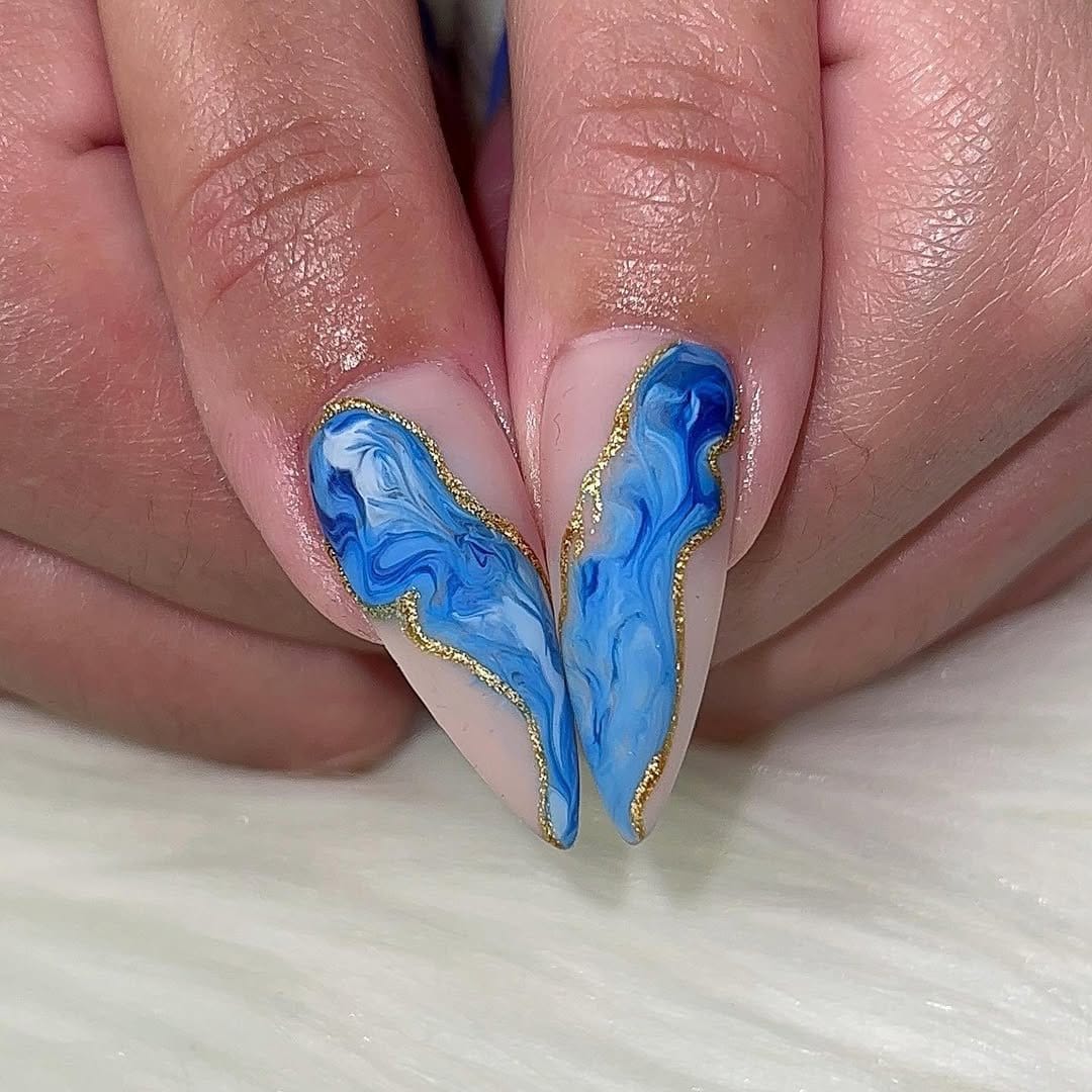 Red nails with teal contrast elements