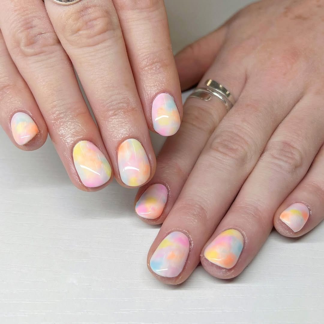 Watercolor nail art with pastel colors