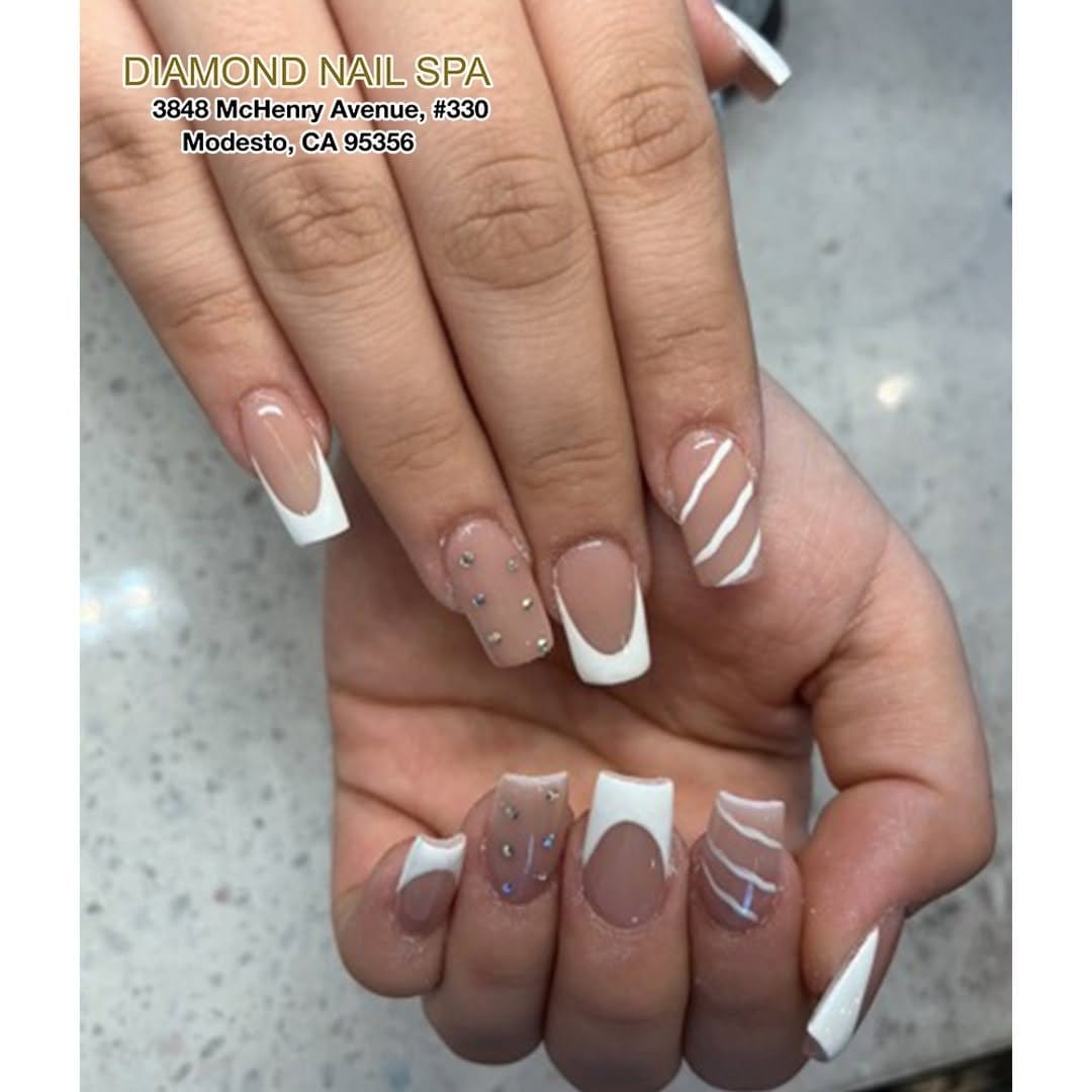 Classic French nails with white tips on a nude base