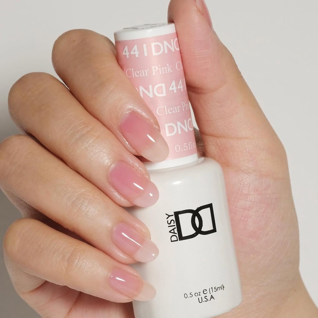 Sheer pink nail polish bottle