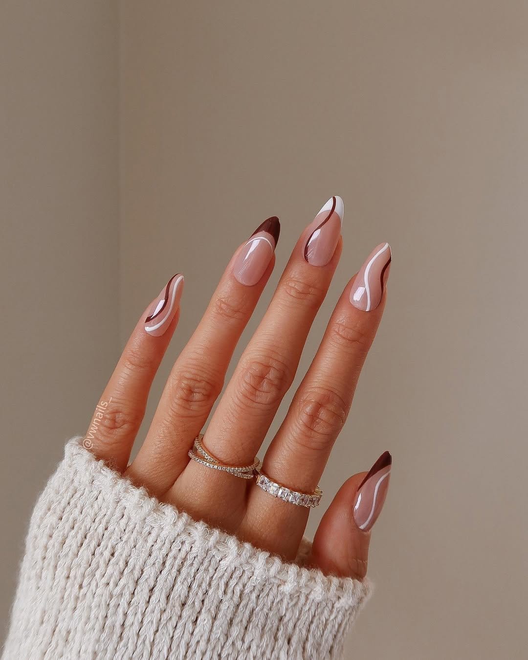 Minimalist line art nails in neutral tones