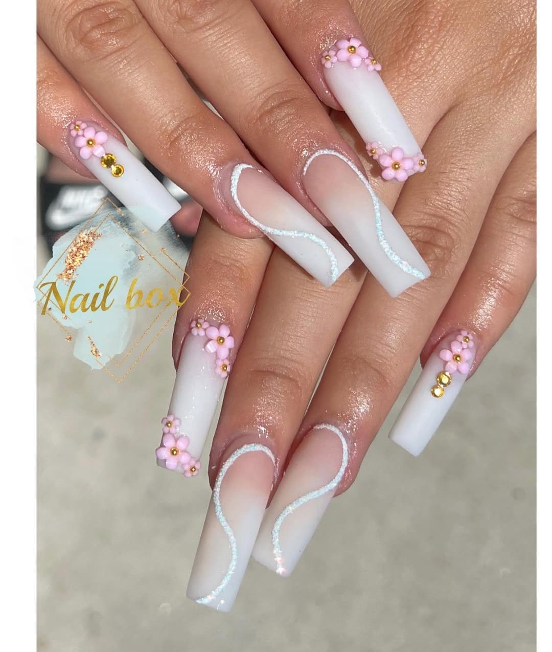 Ombre nails with white floral art