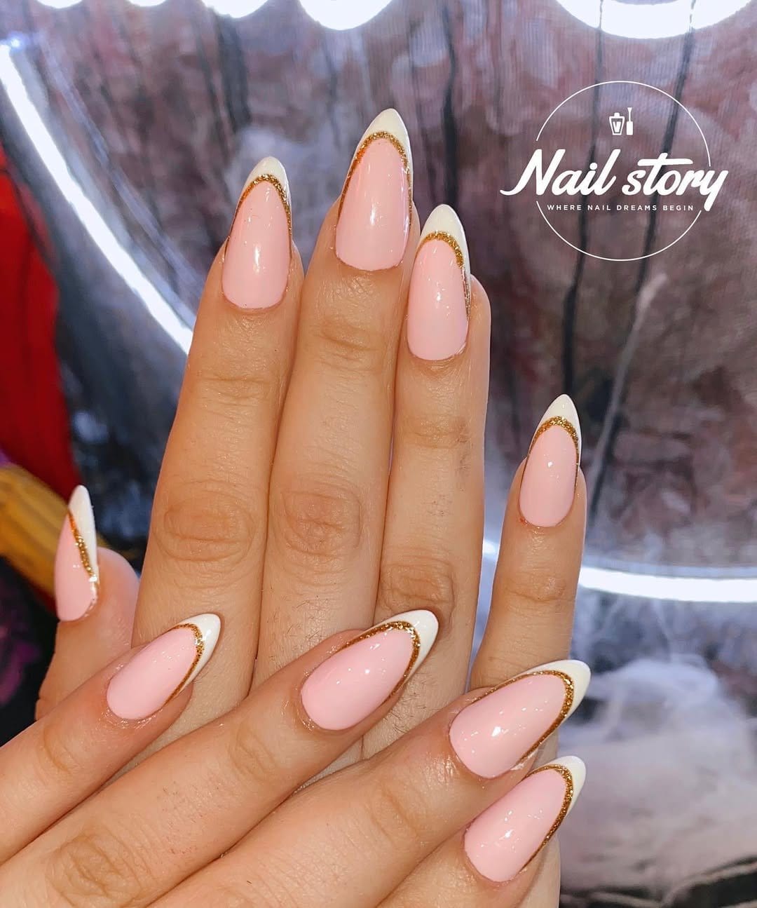 Blush pink nails with gold tips