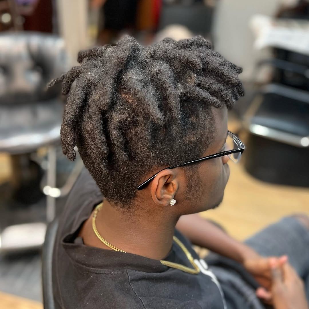 Artistic shaved design with short dreads