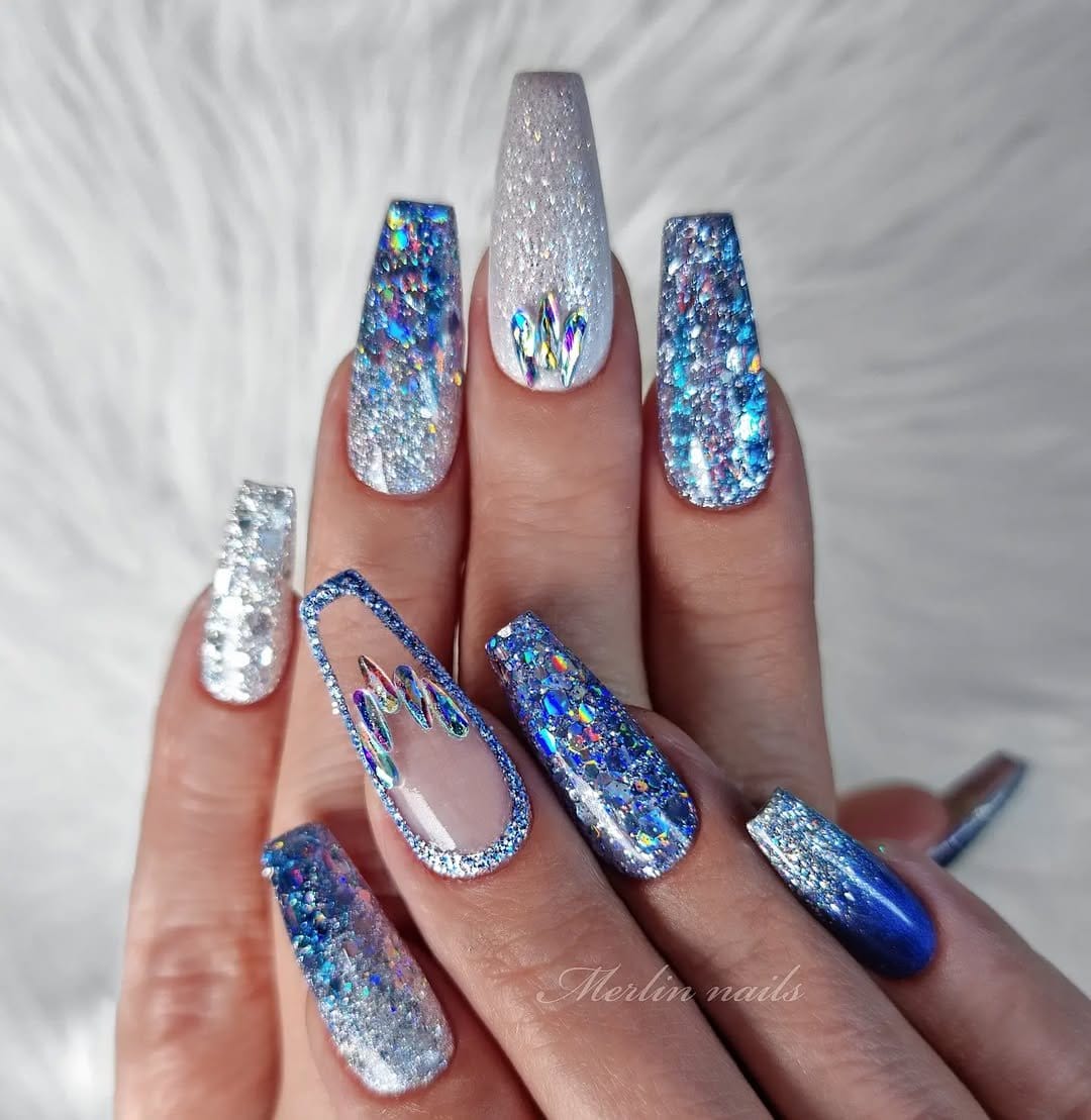 Icy blue nails with silver glitter