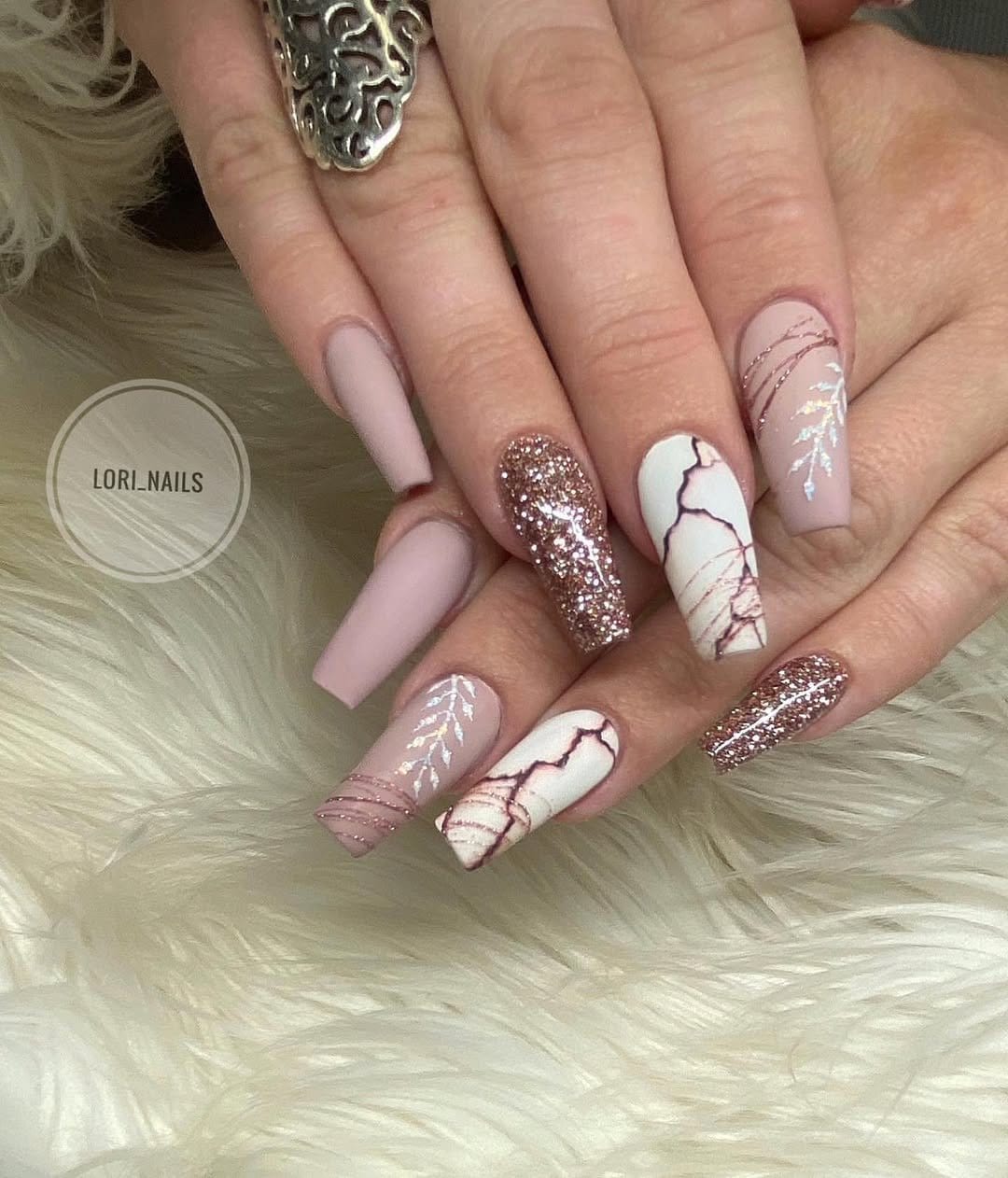 Elegant marble effect nails in neutral tones
