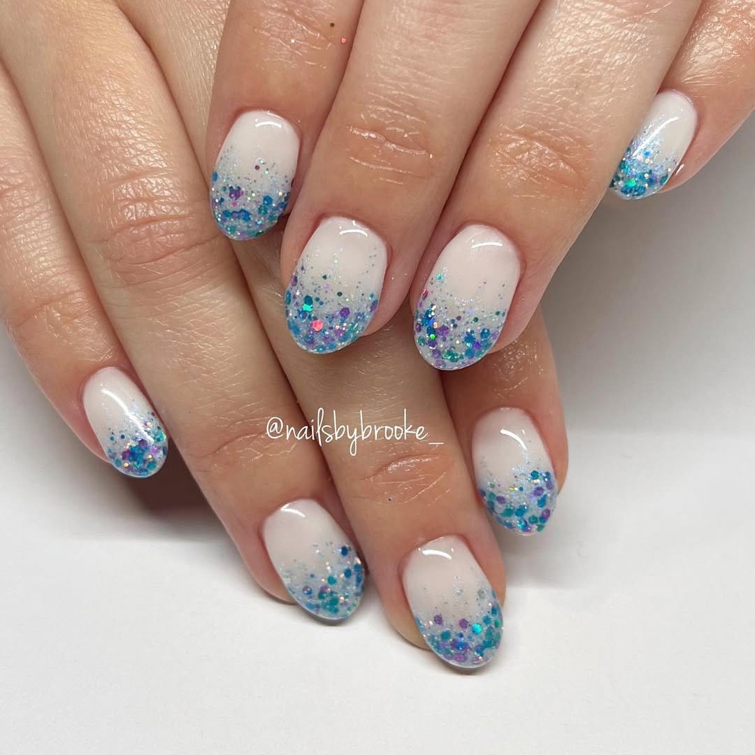 White nails with glitter confetti