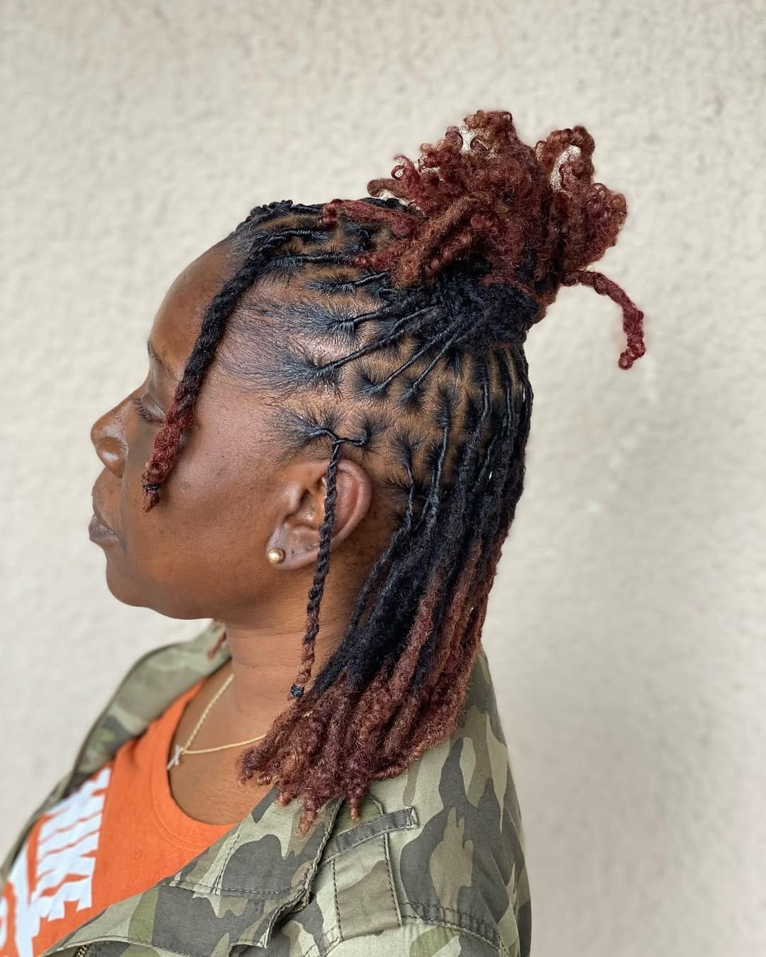 Short dreadlocks half-up half-down style