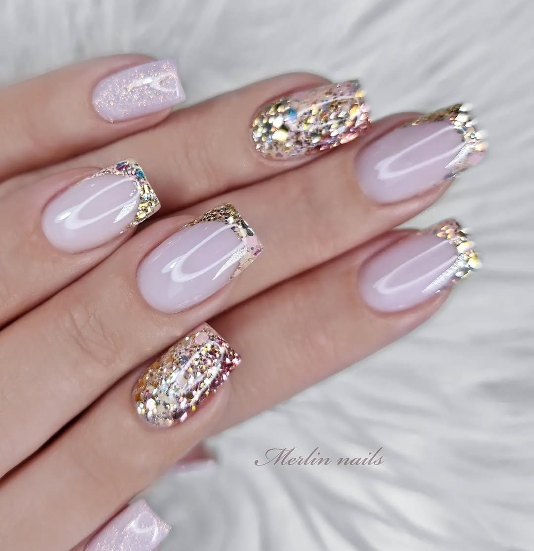 Nude nails with a light glitter overlay