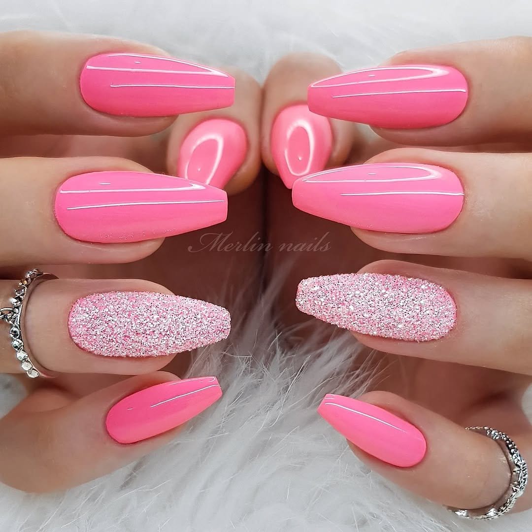 Light pink nails with glitter overlay