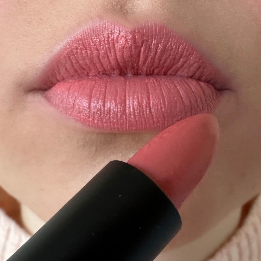 Close-up of soft pink lipstick