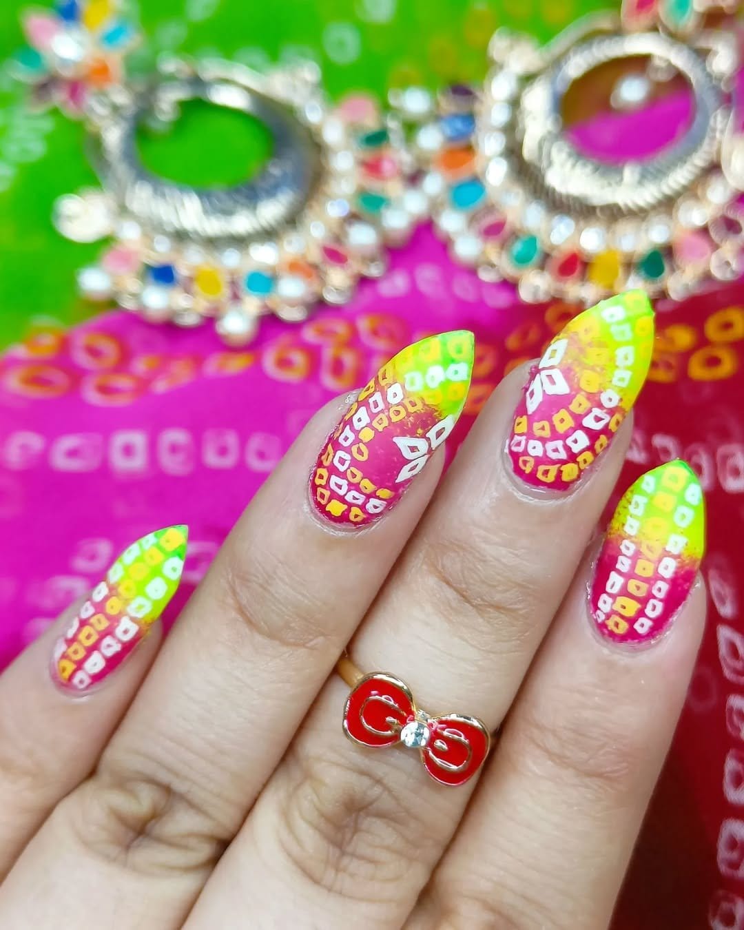 Large botanical print nail art in vibrant colors