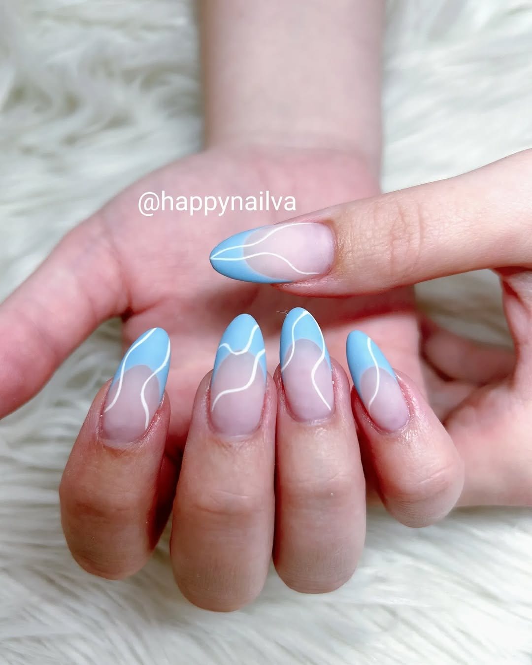 Nautical-themed pastel pink striped nails