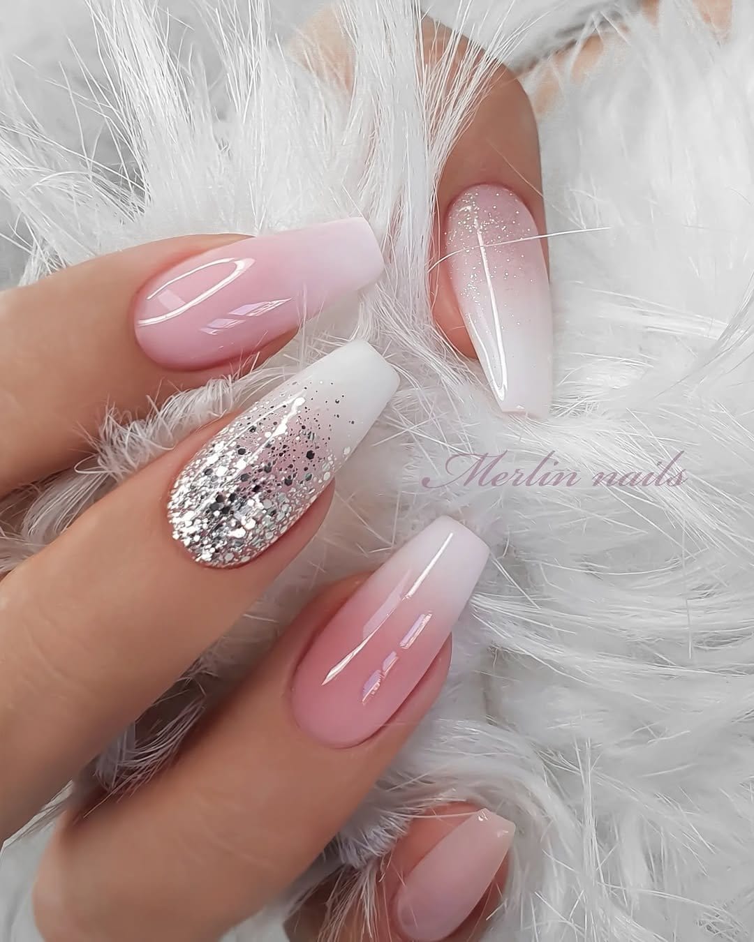 White nails with a subtle glitter fade effect