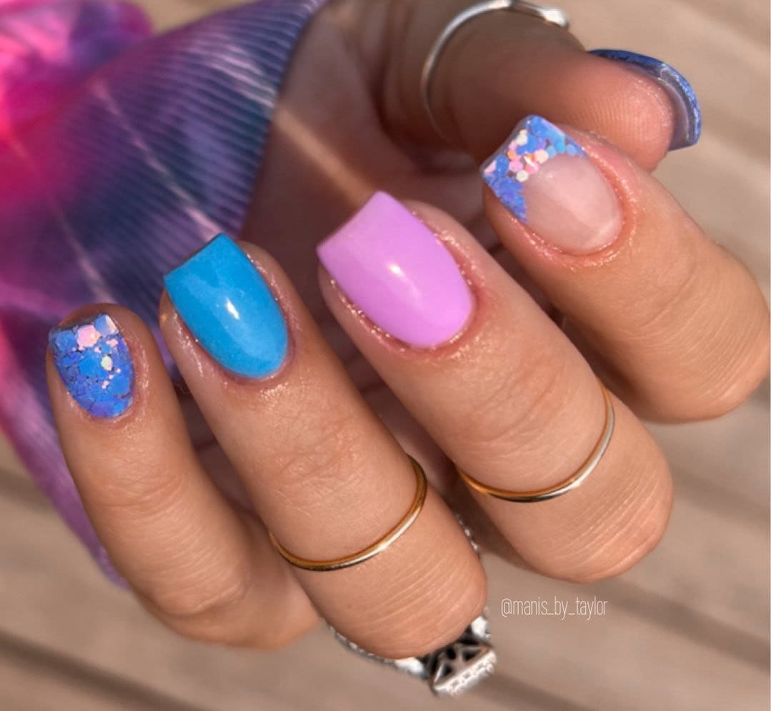 Sweet pink and blue pastel French tips resembling cotton candy