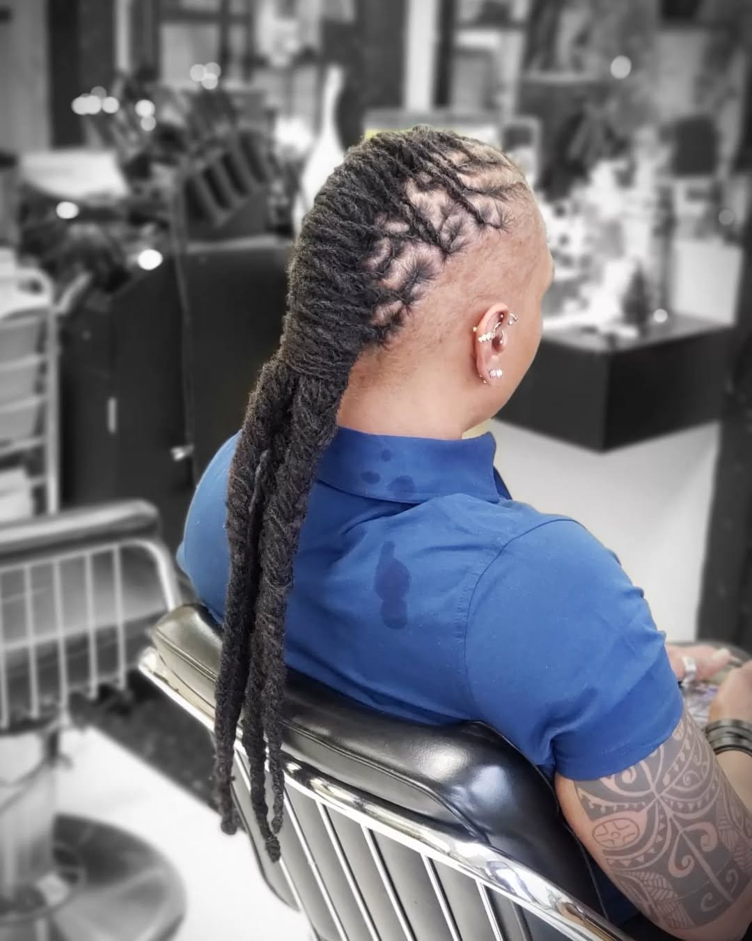 Bold shaved sides with dread top