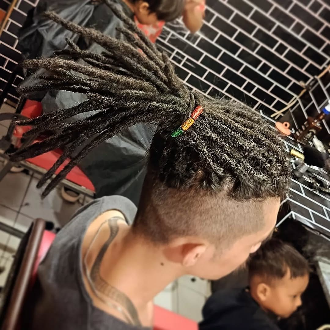 Distinctive faux hawk dread style