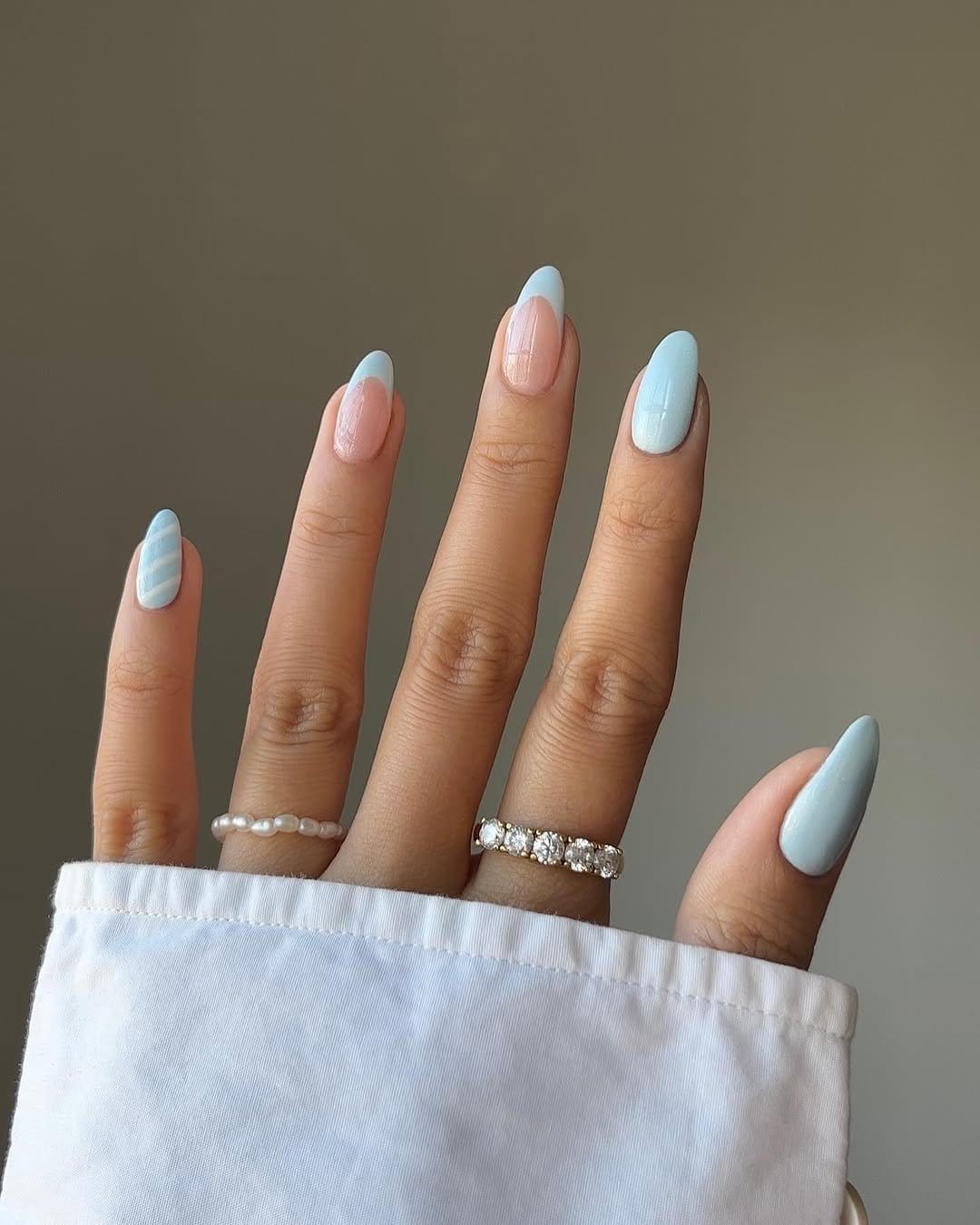 Sky blue nails with subtle shimmer