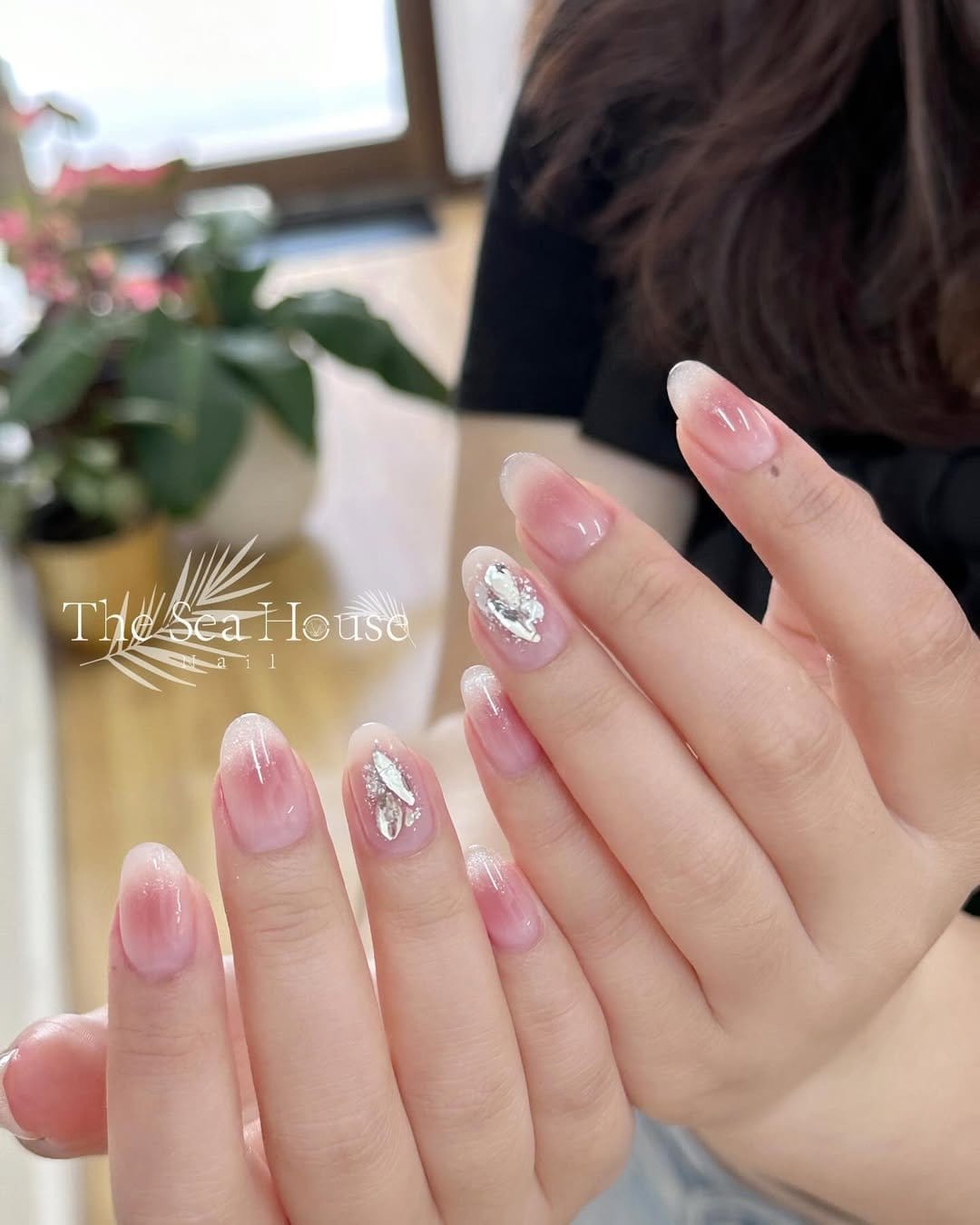 Nails with tiny diamond-shaped accents