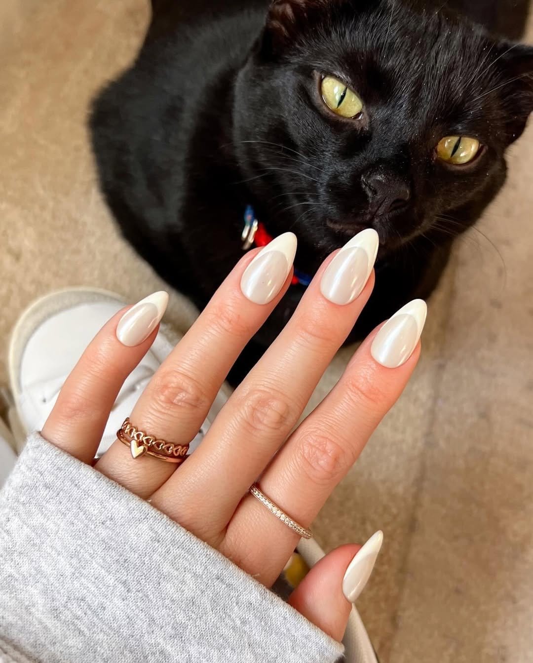 Pearly white nails glistening in sunlight