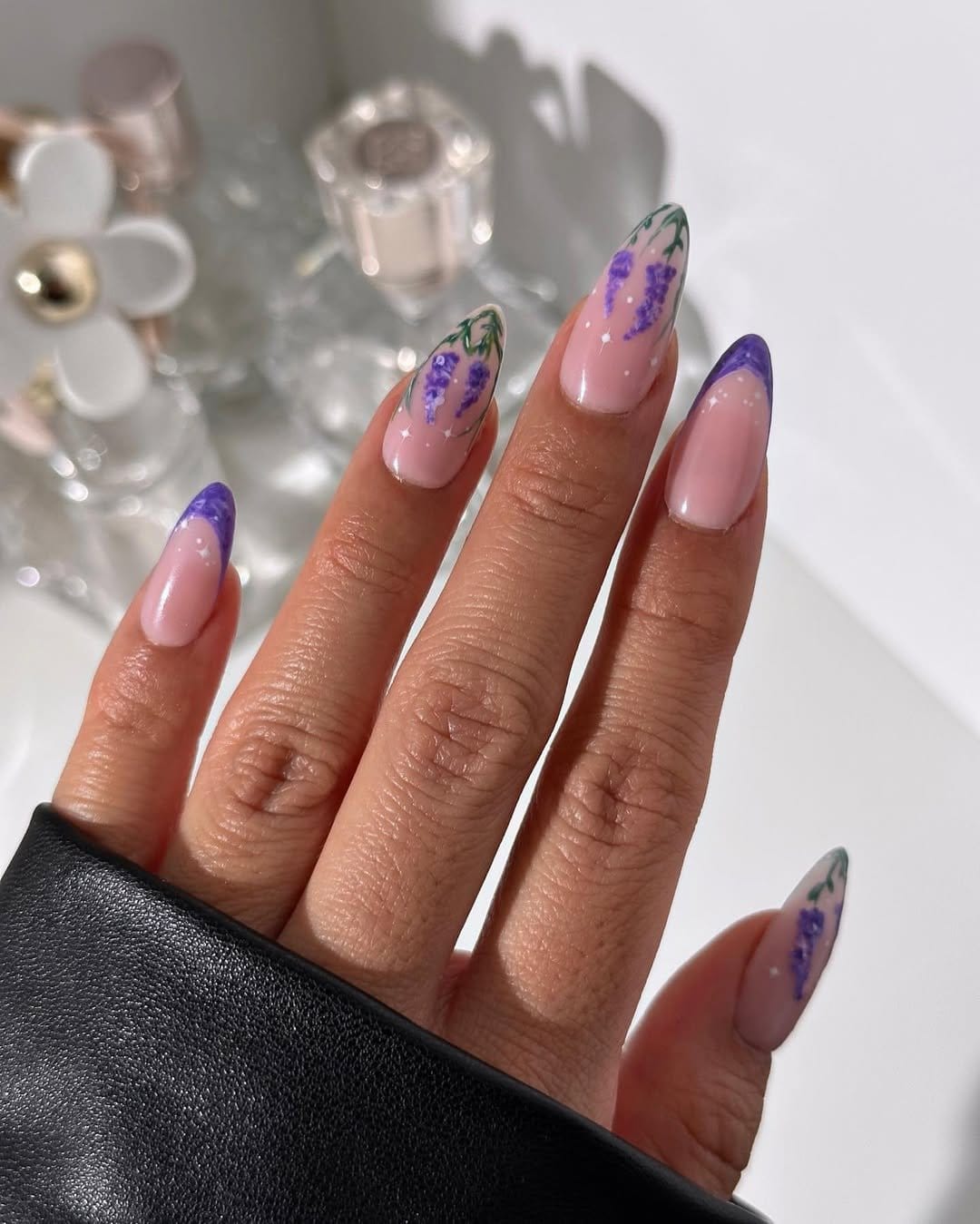 Ethereal lavender ombre nails holding a lavender bouquet