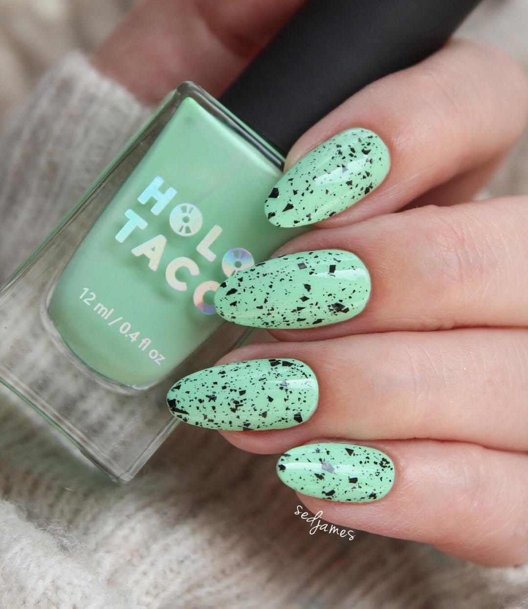 Mint green striped nail design