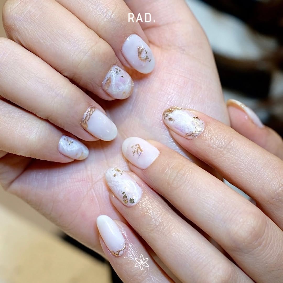 White nails with glitter and foil combo
