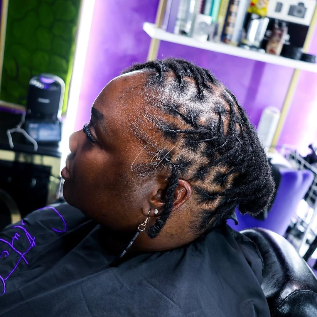 Short locs twisted to the side