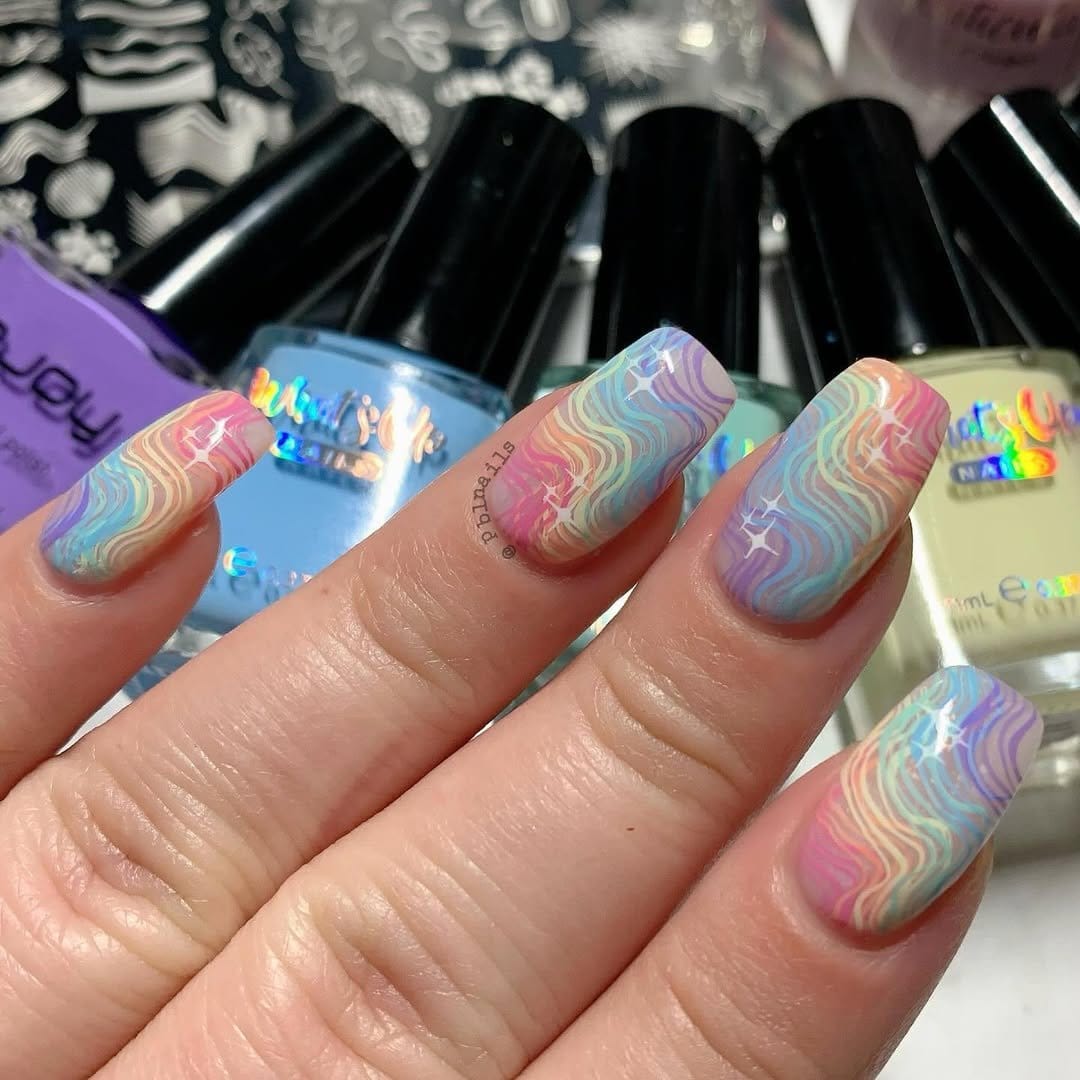 Pastel rainbow nails lined up