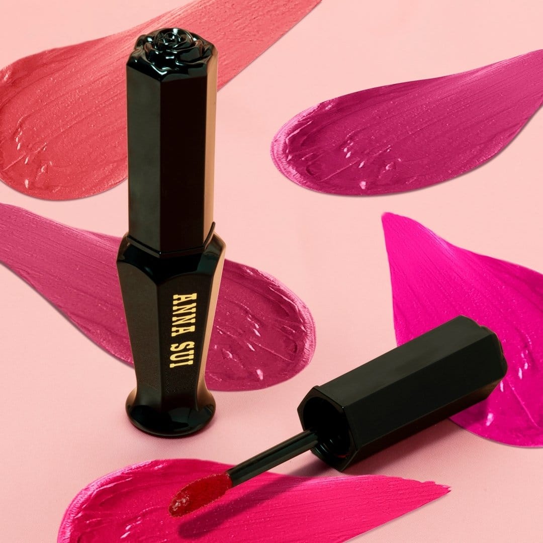 Glitter-infused lipstick with sequined background