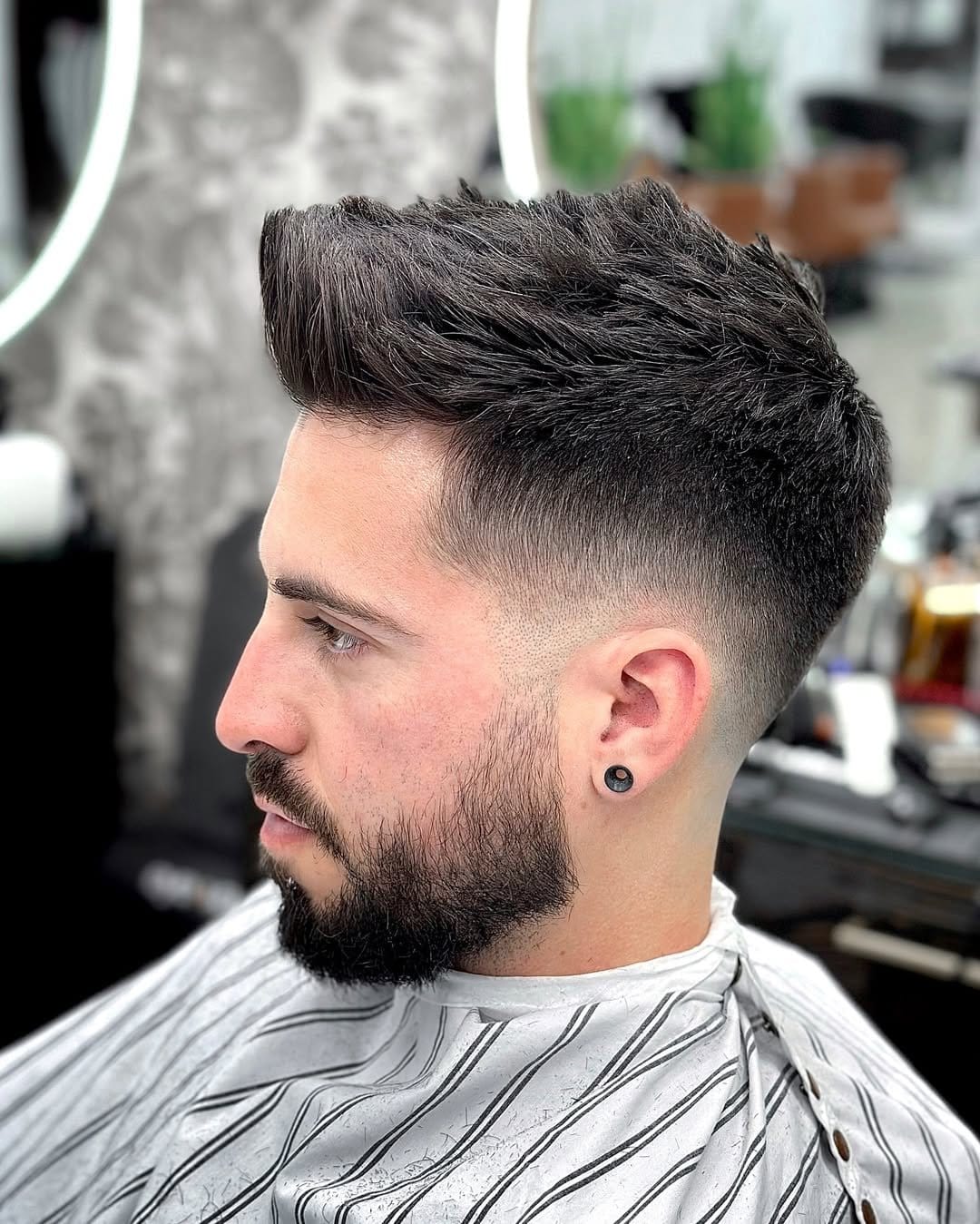 Trendy faux hawk with short dreadlocks